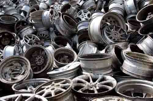 Salvaged car parts are ready to be recycled